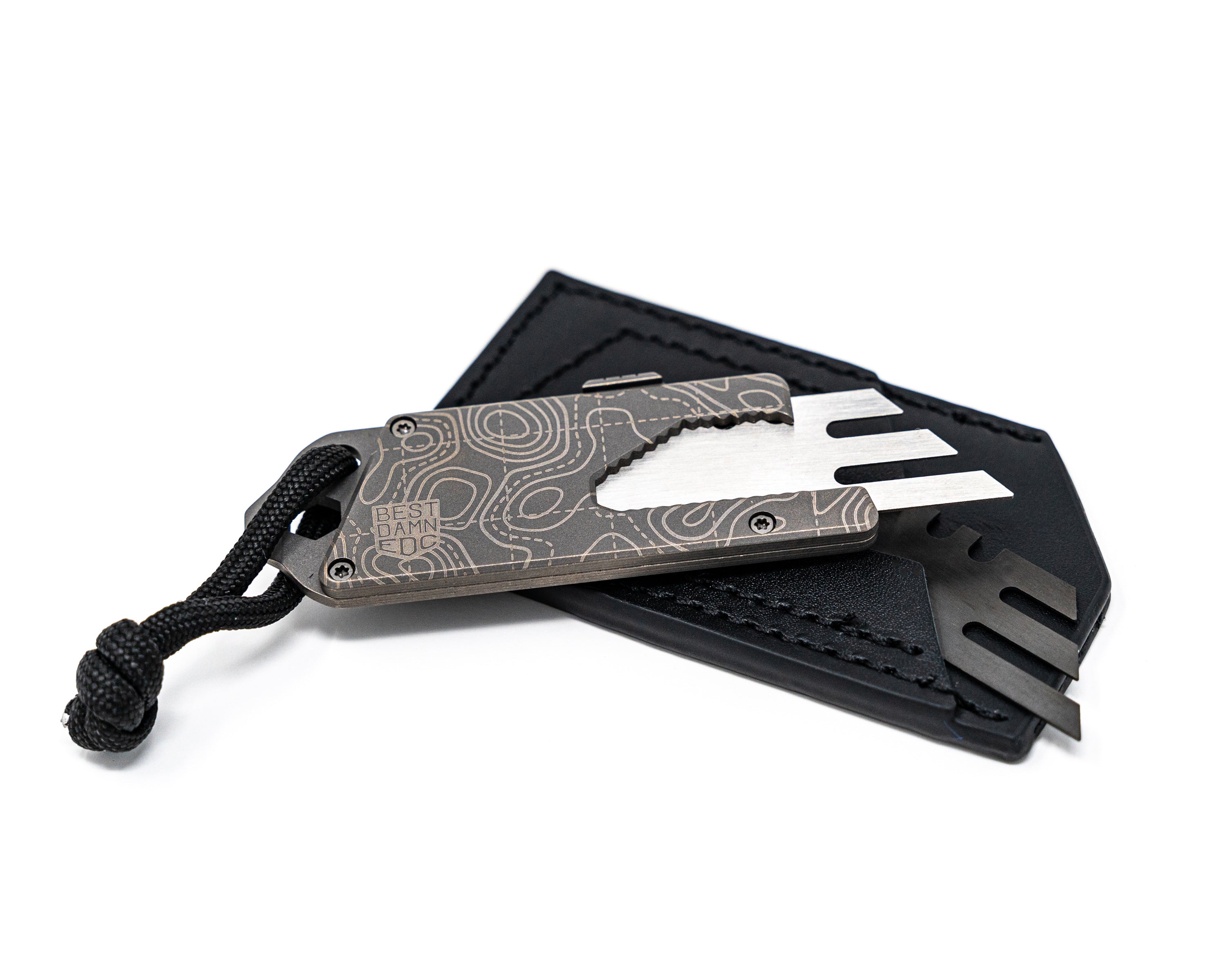 Overhead front angle view of Best Damn EDC TPT Slide Box Cutter Tool in Stonewash Topo