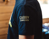 View of left sleeve of navy color t-shirt featuring the Carry Commission Logo