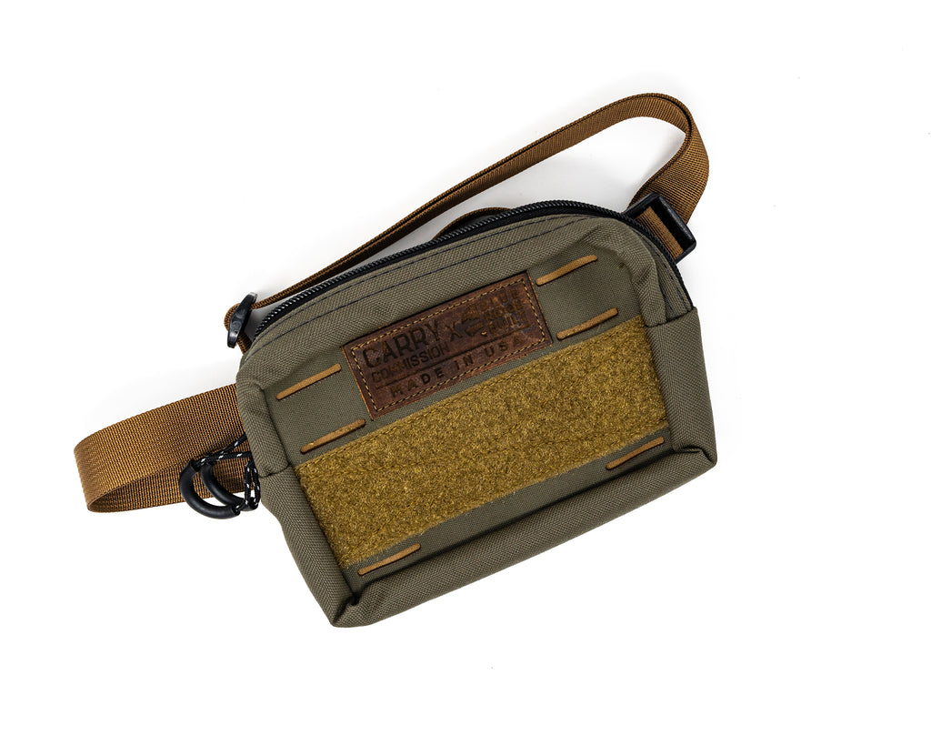 Front view of Bum Bag in green and tan color way with leather patch logo