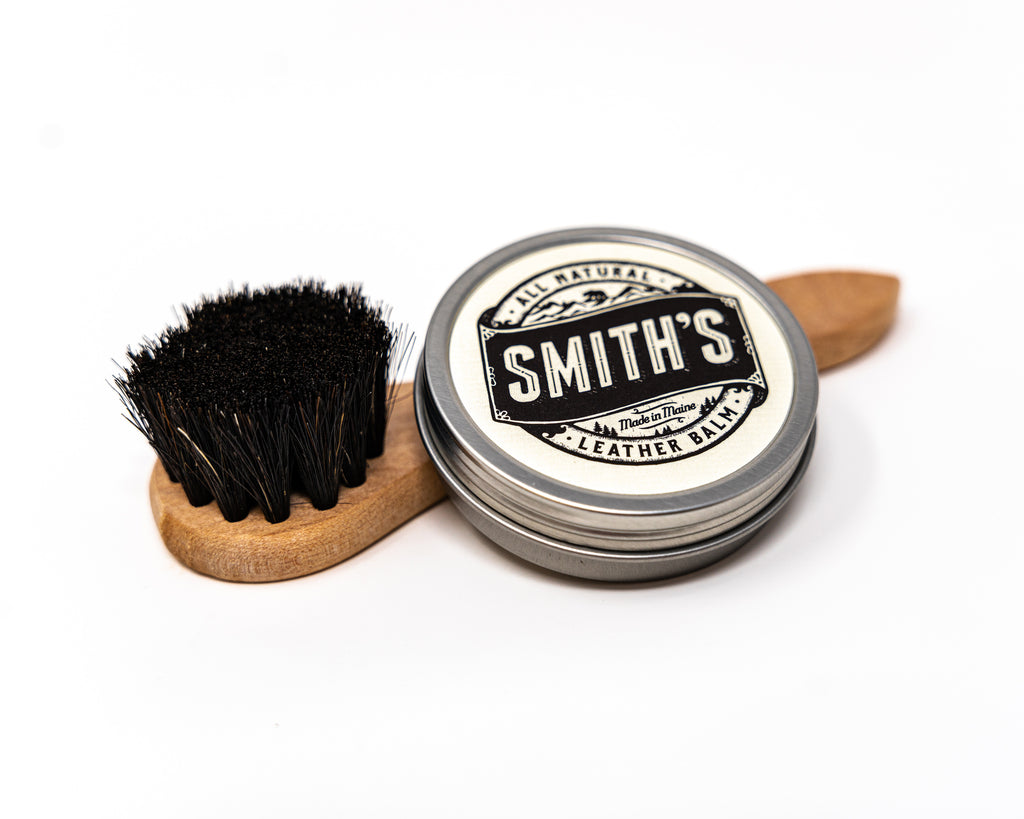 Top of Smith's Leather Balm 1oz Can with Smith's Horse Hair Dauber Brush on white background